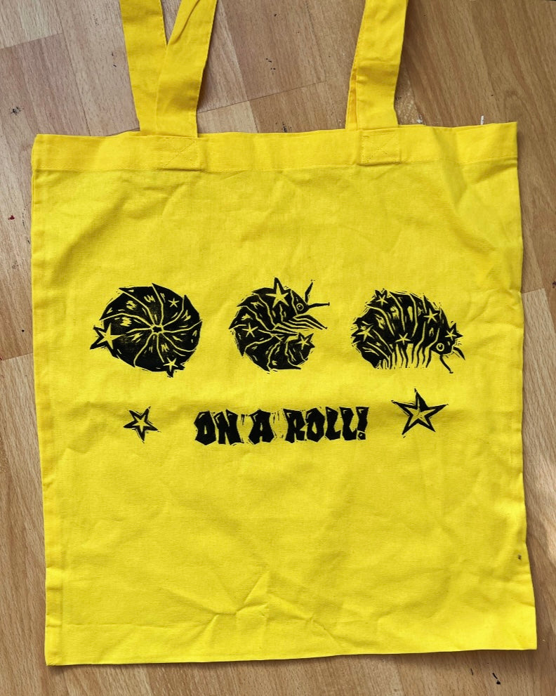 ON A ROLL! yellow woodlouse/isopod tote bag