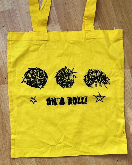 ON A ROLL! yellow woodlouse/isopod tote bag